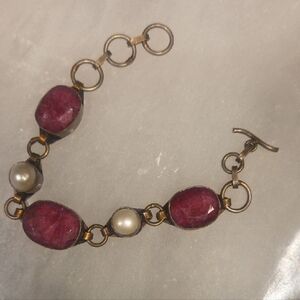 Elegant Gold and Pink Bracelet